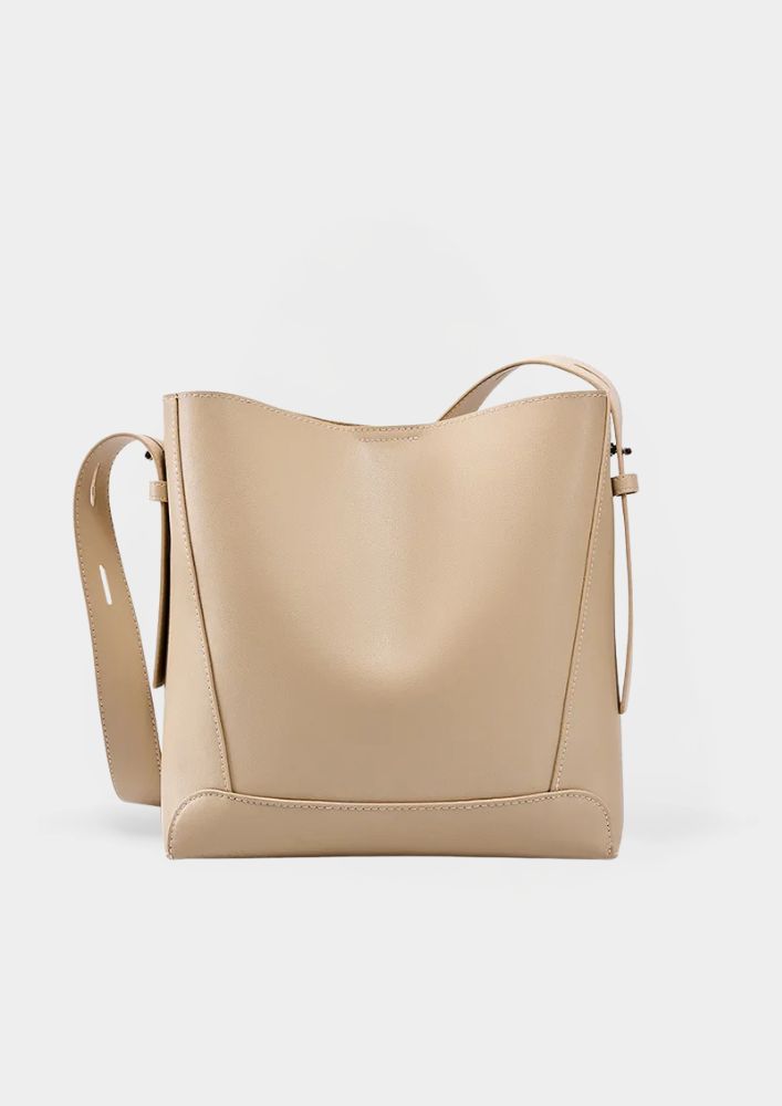 Tine™ – Stylowa torebka na ramię w piaskowym kolorze z paskowym uchwytem