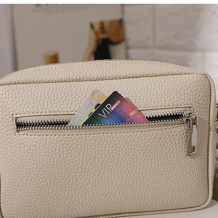 Nora™Elegancka kremowa torba codzienna