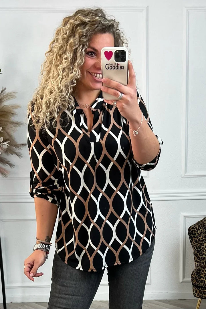 Joanna | Luźna bluzka z długim rękawem i eleganckim wzorem 